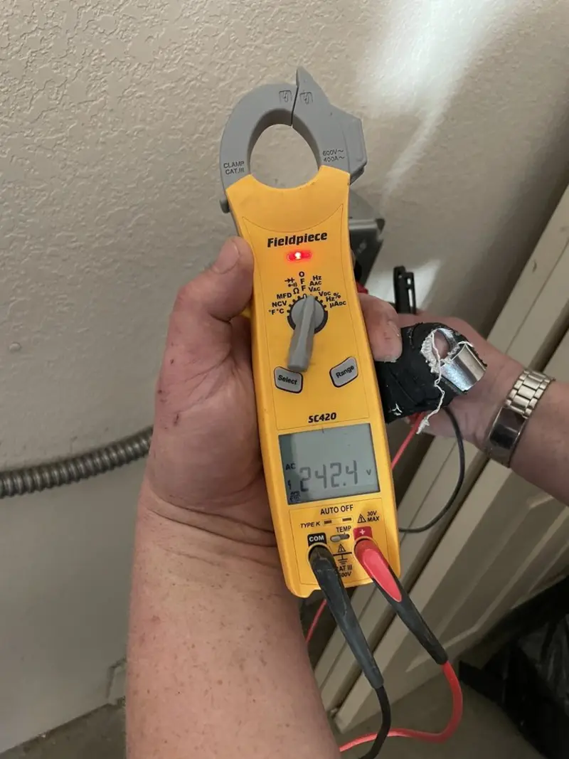 Voltage testing with clamp meter during Outlet Installation in Pocono